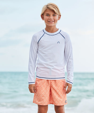 Boy wearing Fisher Island Swim Trunks